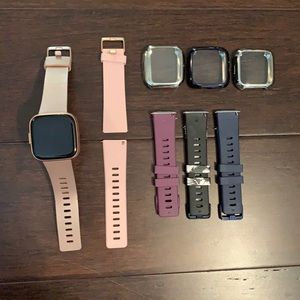 Fitbit versa 2 with accessories (cover and bands)